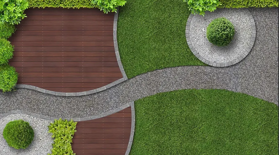 Overhead view of a hardwood deck, stone path and lawn in a finished backyard